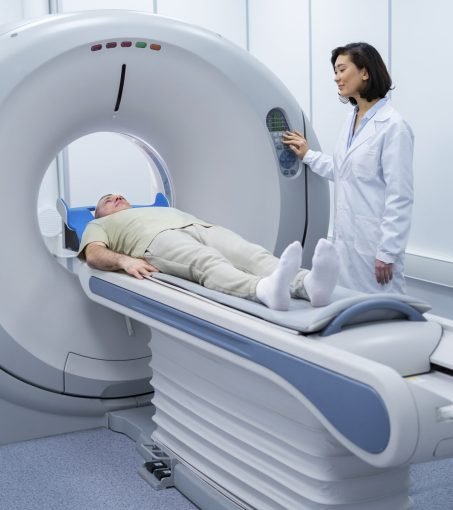 doctor-getting-patient-ready-ct-scan